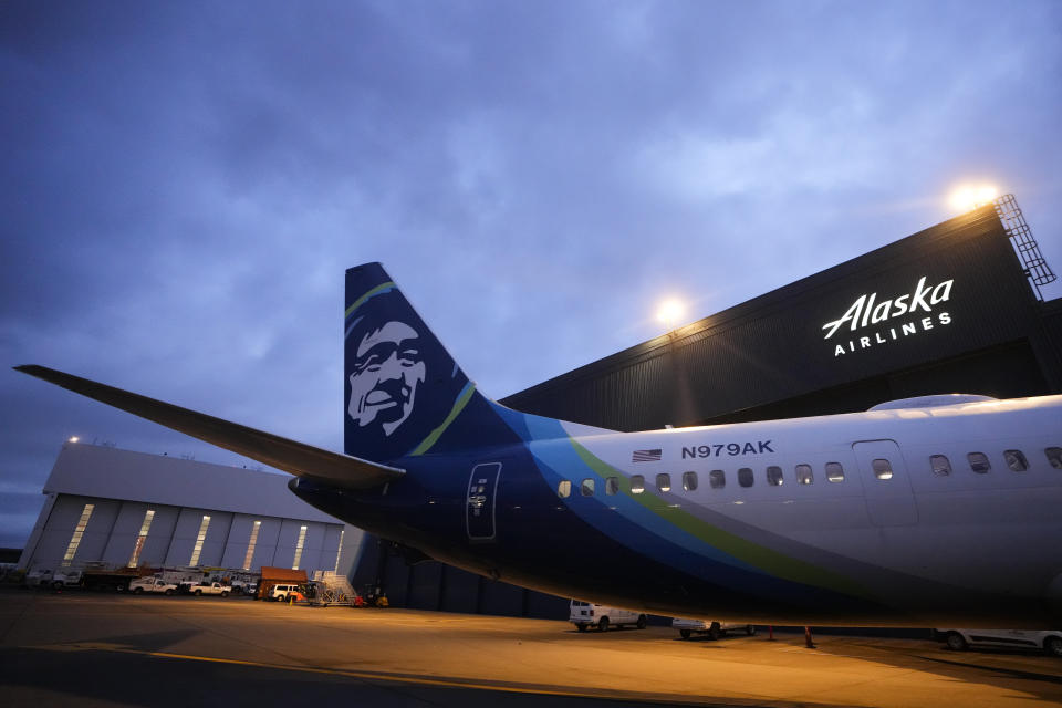 File - An Alaska Airlines Boeing 737 Max 9 awaits inspection at the airline's hangar at Seattle-Tacoma International Airport onJan. 10, 2024, in SeaTac, Wash. Alaska Airlines has begun flying Boeing 737 Max 9 jetliners again for the first time Friday, Jan. 26, since they were grounded after a panel blew out of the side of one of the airline's planes. (AP Photo/Lindsey Wasson, File)