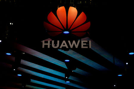 FILE PHOTO: A Huawei logo is pictured during the media day for the Shanghai auto show in Shanghai, China April 16, 2019. REUTERS/Aly Song/File Photo