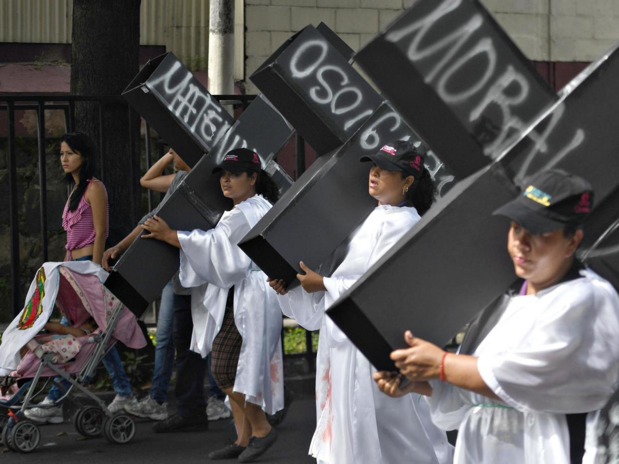 Women in El Salvador protest laws banning abortion AFP/Getty: AFP/Getty