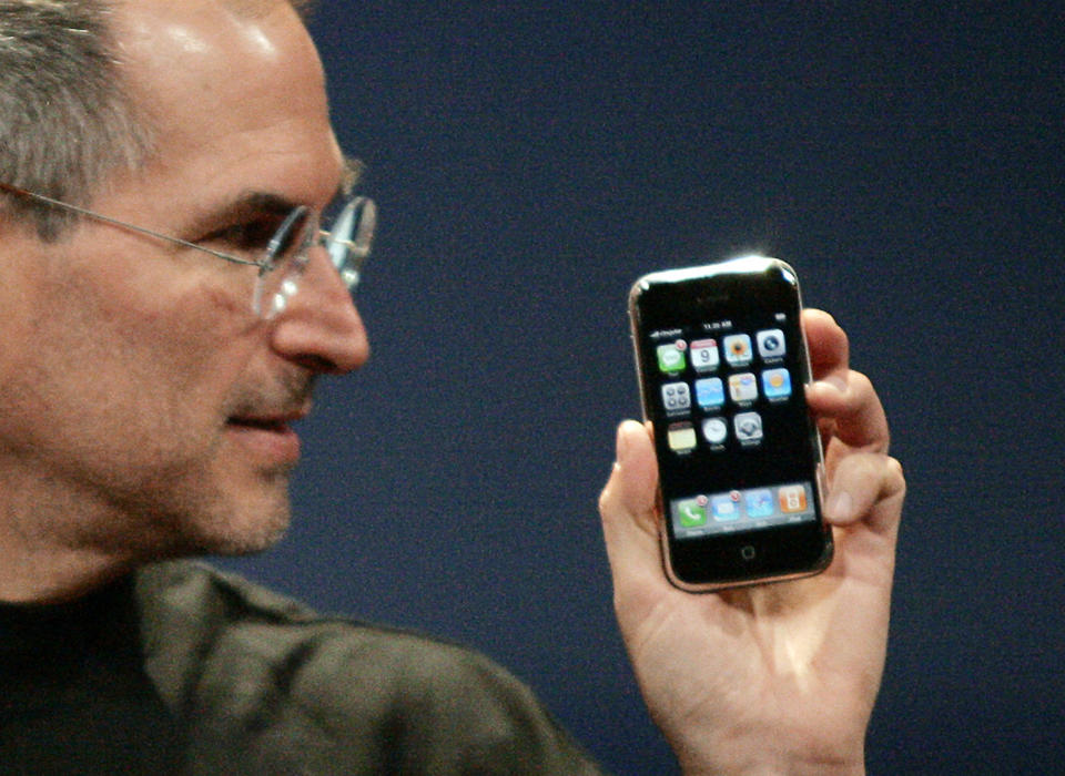 Apple Computer CEO Steve Jobs holds the new iPhone in San Francisco, Jan. 9, 2007. (Photo: Reuters/Kimberly White)