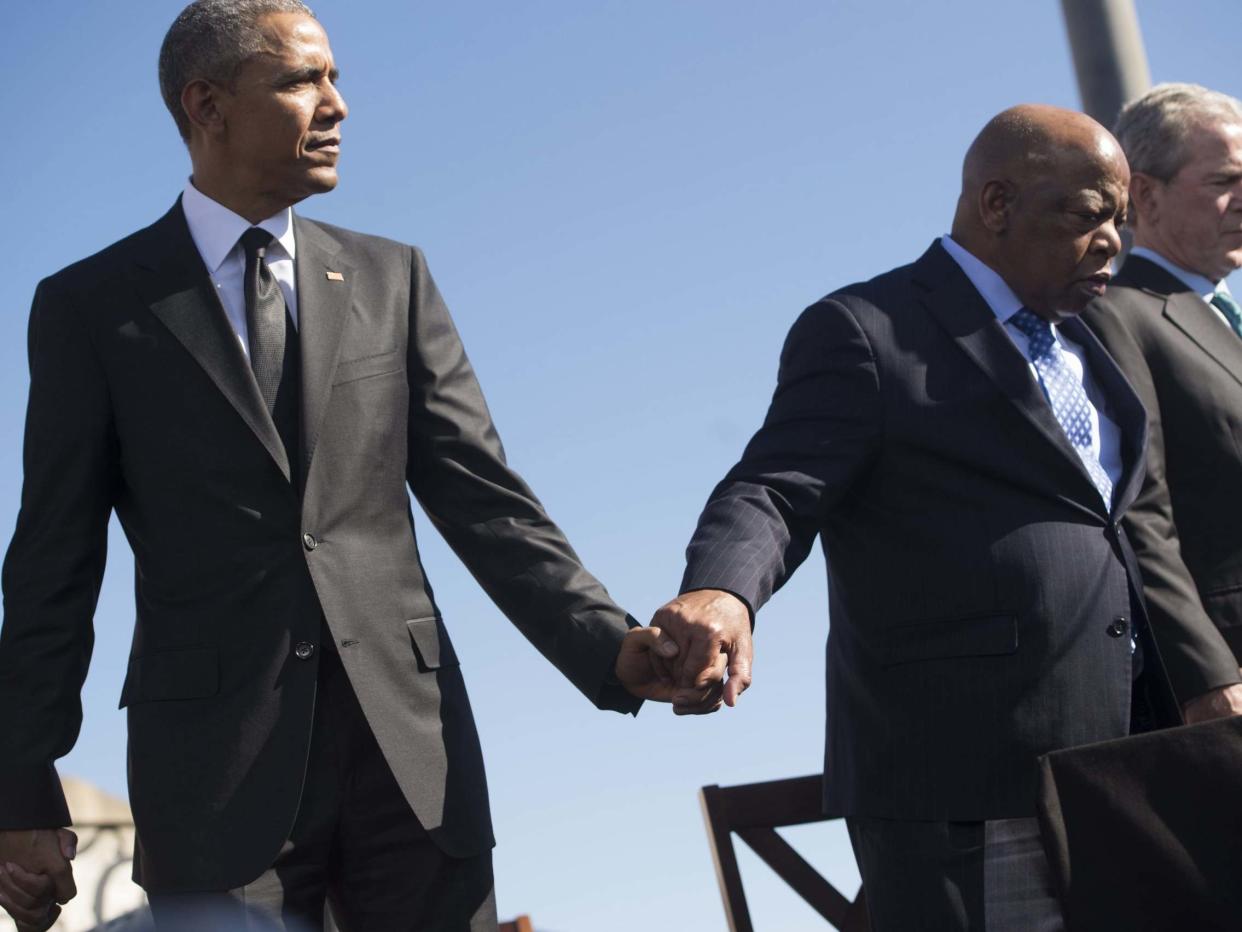 Former president Barack Obama and late congressman John Lewis: AFP via Getty Images