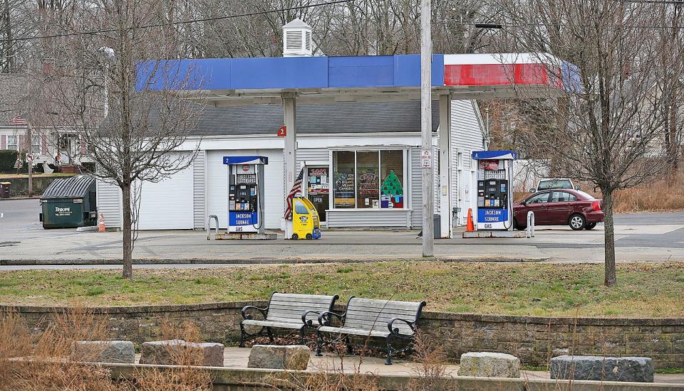 The gas station and garage at 1441 Commercial St. in Lower Jackson Square in Weymouth is being considered for a four-story apartment building.