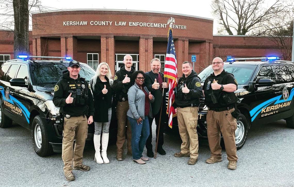 Pro wrestling great “Hacksaw” Jim Duggan, third from right, and his wife Debra Duggan, second from left, are pictured with members of the Kershaw County Sheriff’s Office. That includes, from left, Master Deputy Harrison Wells, Cpl. John Patton, Brenda Johnson, Lt. Ben Royalty, and Deputy Joshua Chavis.