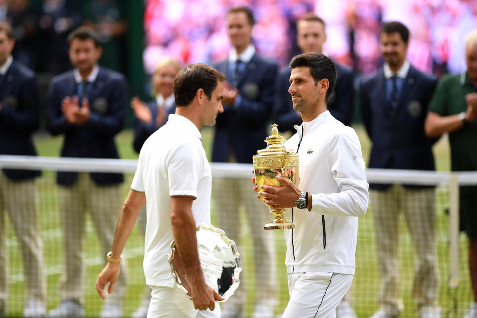 Novak Djokovic defeated Roger Federer in a five-set instant classic to defend the men's Wimbledon title. (Photo by Matthias Hangst/Getty Images)