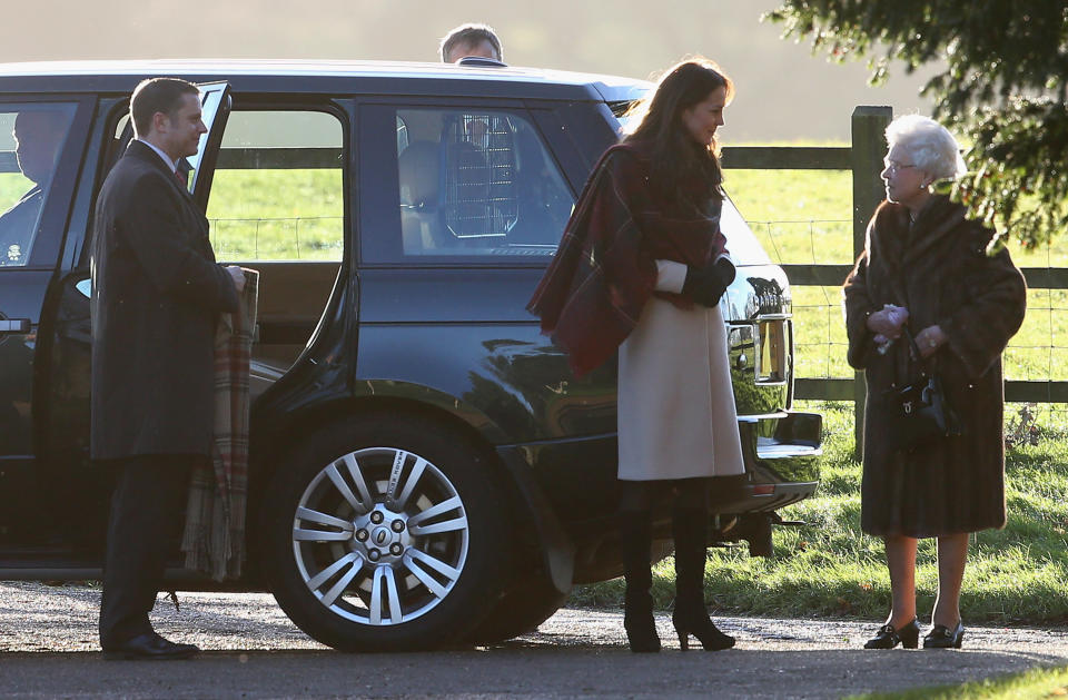 <p>Kate was spotted with the Royal Family for the early morning church service in 2013, wearing a cream coat, a tartan wrap from Really Wild and her Aquatalia ‘Rhumba’ boots. (Getty) </p>