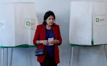 Salome Zurabishvili, presidential candidate supported by the governing Georgian Dream Party, leaves a voting booth at a polling station during presidential election in Tbilisi, Georgia October 28, 2018. REUTERS/David Mdzinarishvili
