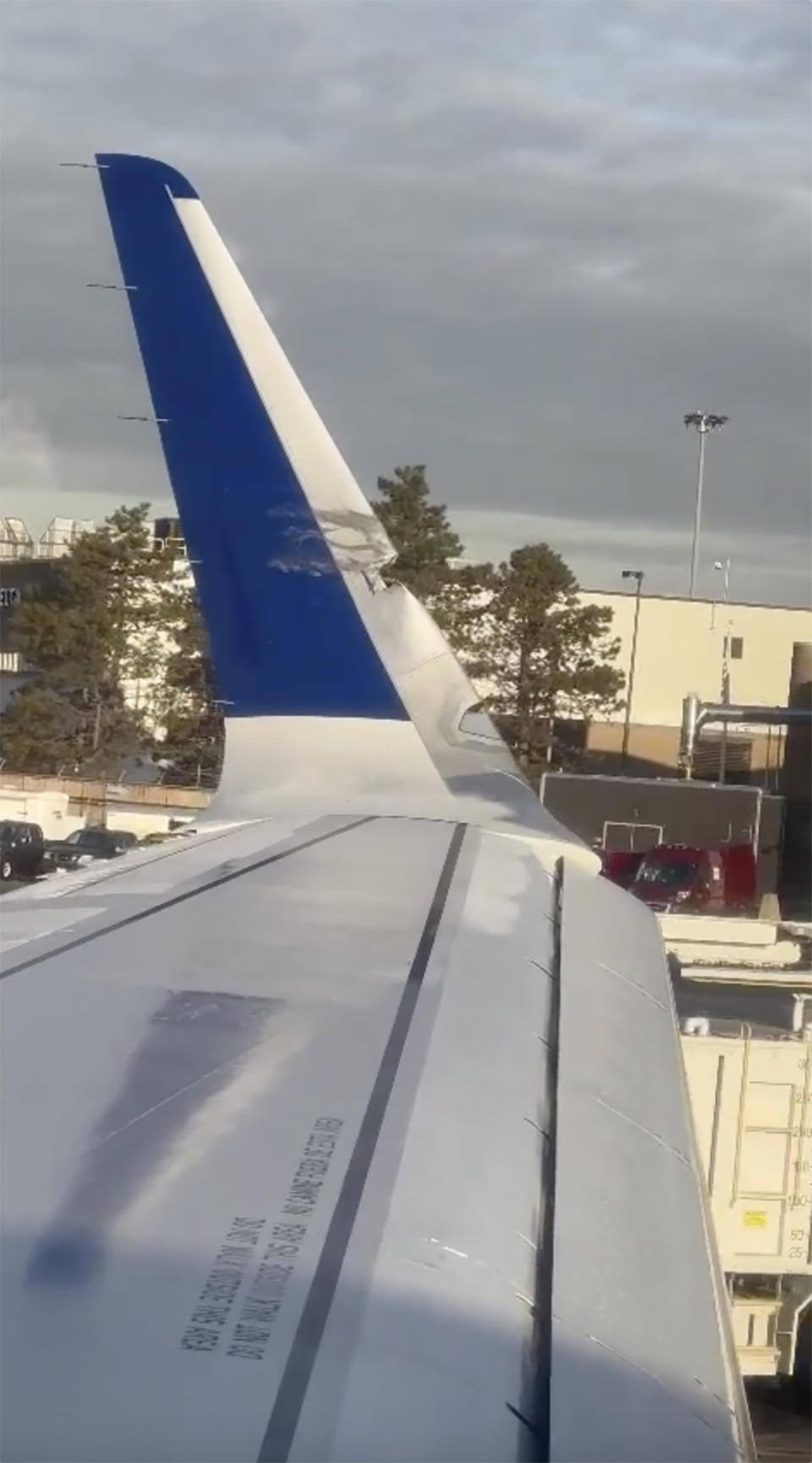 This image provided by Brian O'Neil shows a damaged plane's wingtip after two JetBlue planes made contact in a minor collision at Boston Logan International Airport on Thursday, Feb. 8, 2024 in Boston. An airport authority spokeswoman says one plane's wingtip touched another plane’s tail while both Airbus 321 jets were in the de-icing area. (Brian O'Neil via AP) I have received permission for the following footage of the plane collision at Boston Logan International Airport between two Jet Blue planes 2/8. Credit: