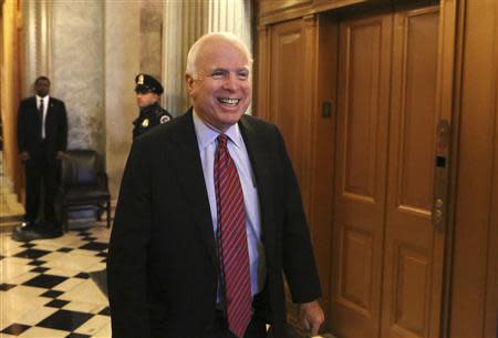 U.S. Senator John McCain (R-AZ) leaves after a Senate cloture vote on budget bill on Capitol Hill in Washington December 17, 2013. REUTERS/Yuri Gripas