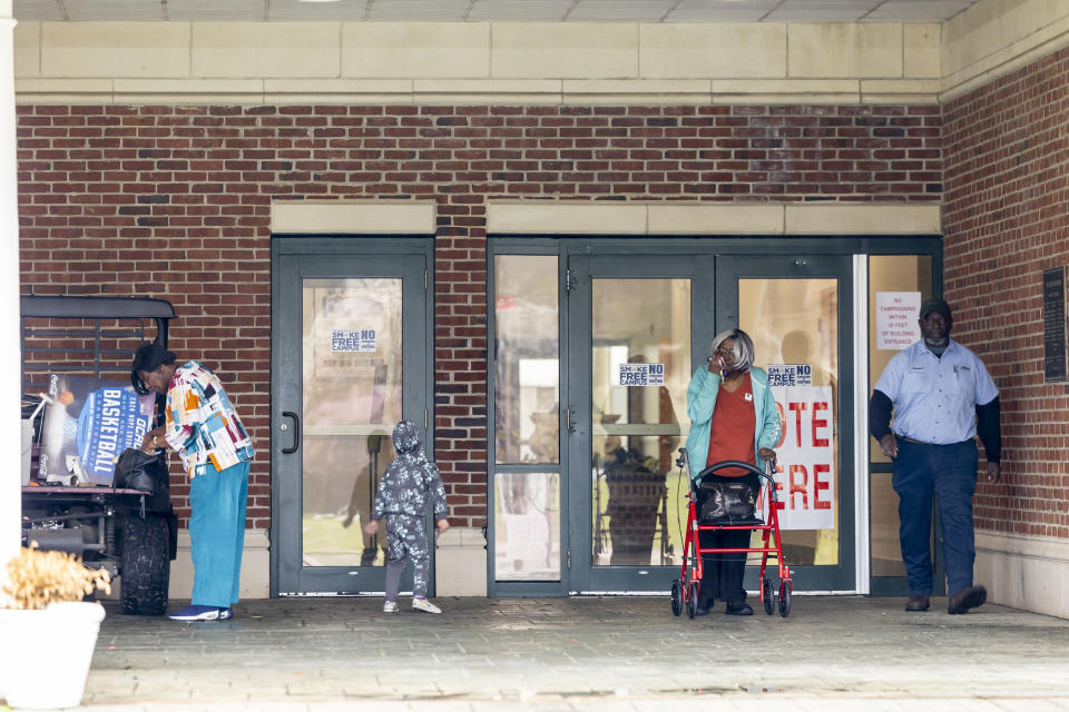 Voters enter and exit Tuscaloosa County Ward 36 during a primary election, Tuesday, March 5, 2024, at Stillman College's Cordell Wynn Humanities & Fine Arts Center, in Tuscaloosa, Ala. (AP Photo/Vasha Hunt)