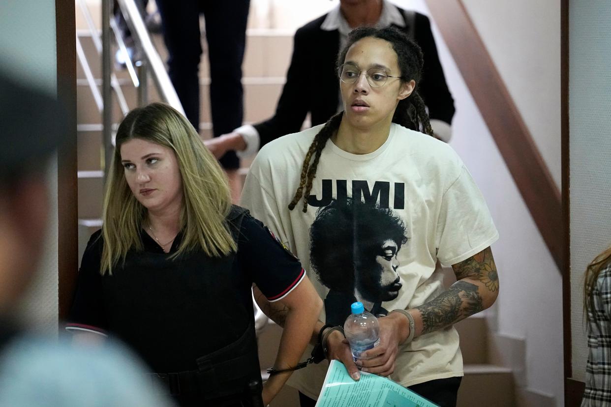 Brittney Griner is escorted to a courtroom for a hearing in Khimki, just outside Moscow, Russia, Friday.