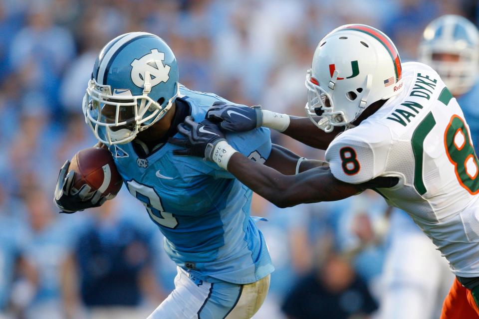 North Carolina Tar Heels wide receiver Greg Little (8) breaks free for a touchdown in the second quarter as Miami Huricanes defensive back DeMarcus Van Dyke (8) defends at Kenan Stadium in Chapel Hill, NC.