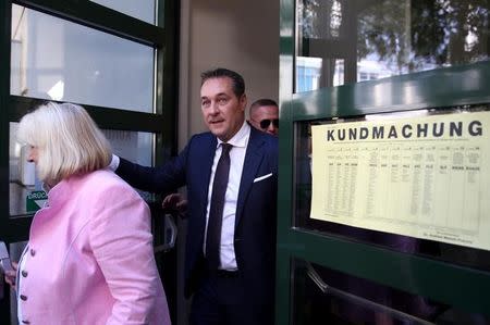 Top candidate and head of far-right Freedom Party (FPOe) Heinz-Christian Strache and his mother Marion Strache leave a polling station in Vienna, Austria October 15, 2017. REUTERS/Michael Dalder