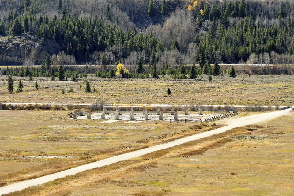 Remnants of the deteriorating field house at Camp Hale near Vail, Colo., on Tuesday, Oct. 11, 2022. The camp was where soldiers of the 10th Mountain Division trained in the harsh, wintry conditions of the Rocky Mountains in preparation for fighting in the Italian Alps during World War II. (AP Photo/Thomas Peipert)