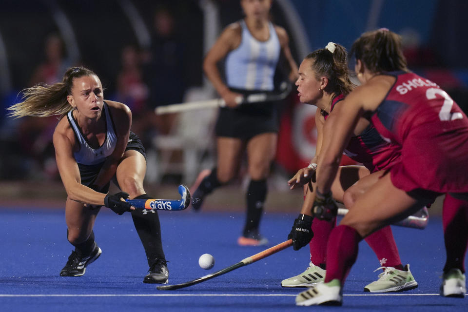 Argentina's Victoria Sauze hits a ball during the women's field hockey gold medal match against the United States, at the Pan American Games in Santiago, Chile, Saturday, Nov. 4, 2023. (AP Photo/Dolores Ochoa)
