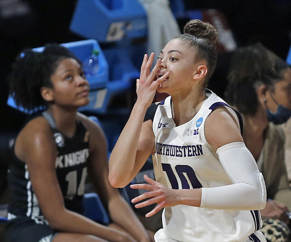 CORRECTS TO MONDAY, MARCH 22, 2021- Northwestern guard Lindsey Pulliam (10) reacts after hitting a three during the first half of a college basketball game in the first round of the women's NCAA tournament at the Greehey Arena in San Antonio, Texas, Monday, March 22, 2021. (AP Photo/Ronald Cortes)