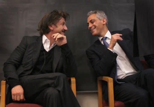 Chicago Mayor Rahm Emanuel (R) and actor and philanthropist Sean Penn chat at Frederick Von Steuben Metropolitan Science Center as part of the World Summit of Nobel Peace Laureates, on April 23, in Chicago, Illinois. The 12th World Summit of Nobel Peace Laureates convenes in Chicago through Wednesday, April 25