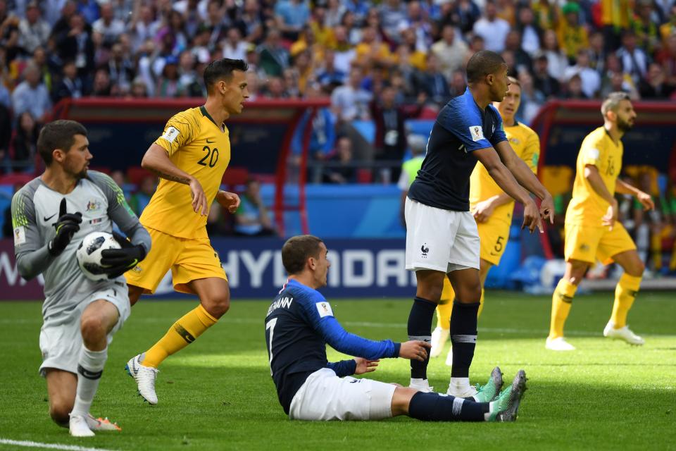 Antoine Griezmann after being brought down by Josh Risdon