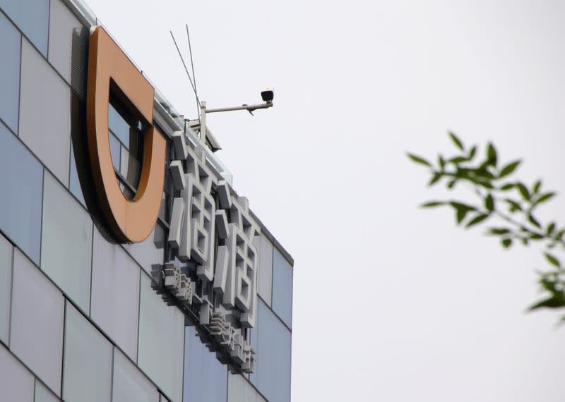 Logo of Didi Chuxing is seen at its headquarters building in Beijing