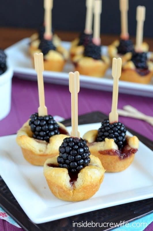 <p>Inside Bru Crew Life</p><p>Melted Brie cheese with blackberry jelly and fresh blackberries.</p><p><strong>Get the recipe: <a href="https://insidebrucrewlife.com/blackberry-brie-bites/" rel="nofollow noopener" target="_blank" data-ylk="slk:Blackberry Brie Bites;elm:context_link;itc:0;sec:content-canvas" class="link ">Blackberry Brie Bites</a></strong></p>