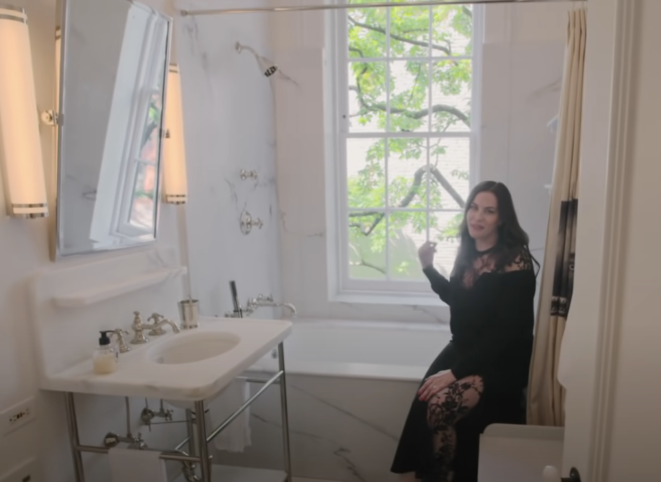 Liv Tyler in a bathroom