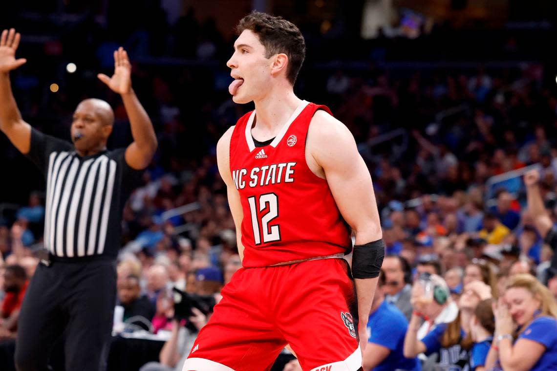 N.C. State’s Michael O’Connell (12) celebrates after hitting a three-pointer during the second half of N.C. State’s 74-69 victory over Duke in the quarterfinal round of the 2024 ACC Men’s Basketball Tournament at Capital One Arena in Washington, D.C., Thursday, March 14, 2024.