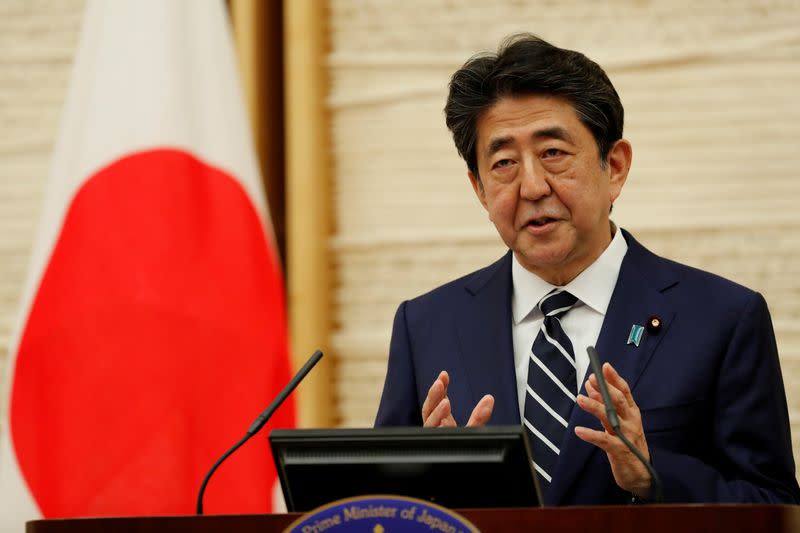 FILE PHOTO: Japan's Prime Minister Shinzo Abe speaks at a news conference in Tokyo