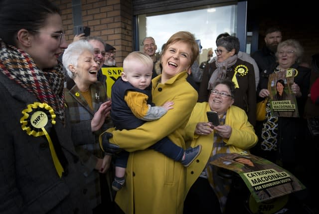 SNP leader Nicola Sturgeon meets 11-month-old Riley Williamson in Gilmerton, Edinburgh