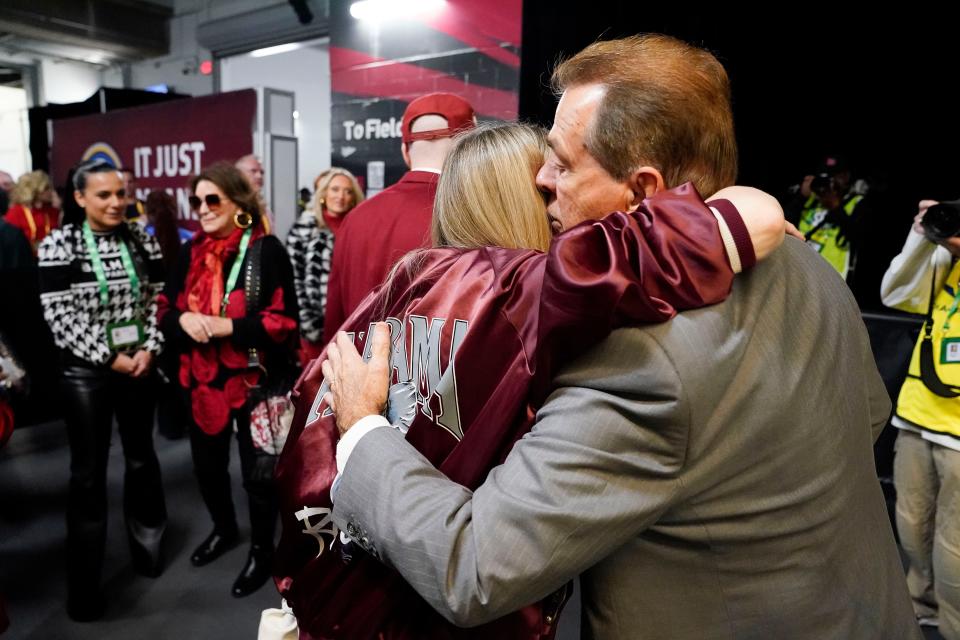 Dec 2, 2023; Atlanta, GA, USA; Kristen Setas greets her father, Alabama Crimson Tide head coach Nick Saban, at Mercedes-Benz Stadium before the SEC Championship Game with Georgia. Mandatory Credit: Gary Cosby Jr.-USA TODAY Sports