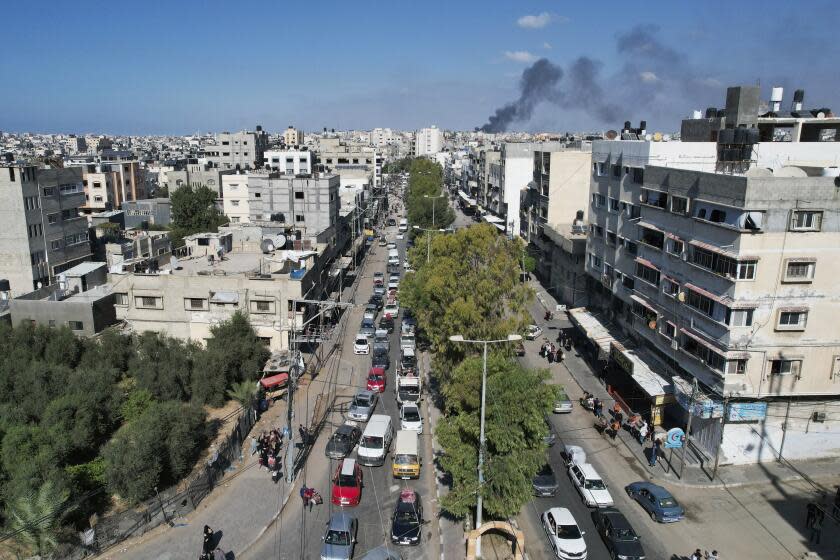 Palestinians flee from northern Gaza to the south after the Israeli army issued an unprecedented evacuation warning to a population of over 1 million people in northern Gaza and Gaza City to seek refuge in the south ahead of a possible Israeli ground invasion, Friday, Oct. 13, 2023. (AP Photo/Hatem Moussa)