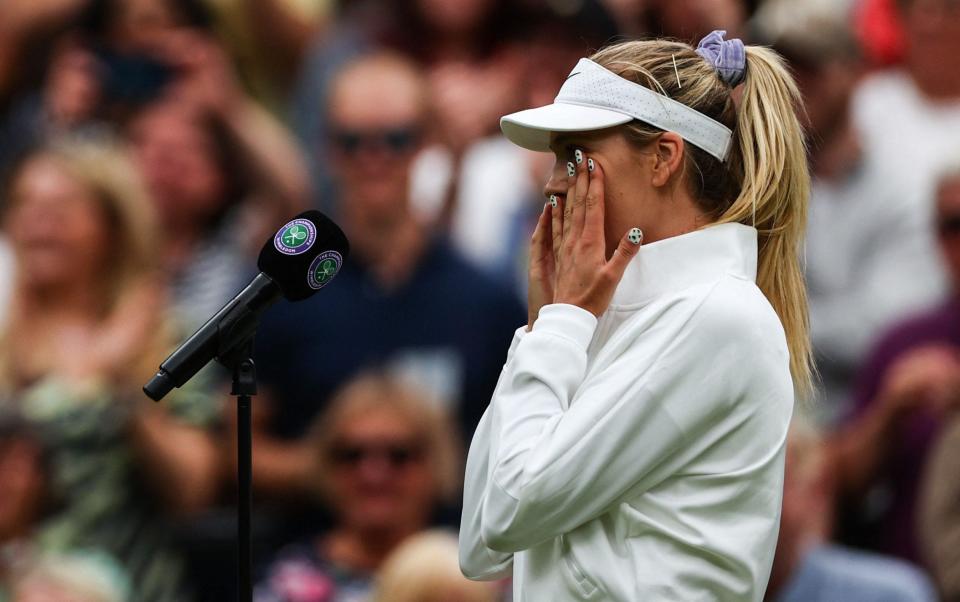 Britain's Katie Boulter cries after winning Czech Republic's Karolina Pliskova at the end of their women's singles tennis match on the fourth day of the 2022 Wimbledon Championships at The All England Tennis Club in Wimbledon, southwest London, on June 30, 2022. - GETTY IMAGES