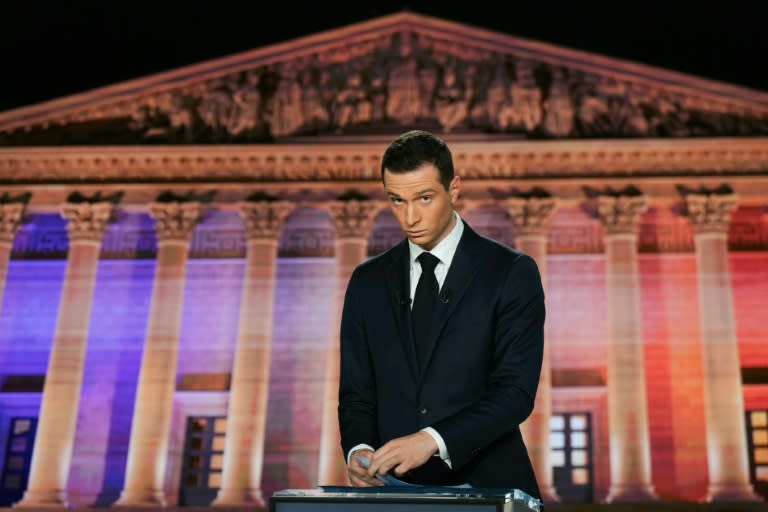 National Rally chief Jordan Bardella could have a chance to lead a government in 'cohabitation' with his rival Emmanuel Macron (Dimitar DILKOFF)