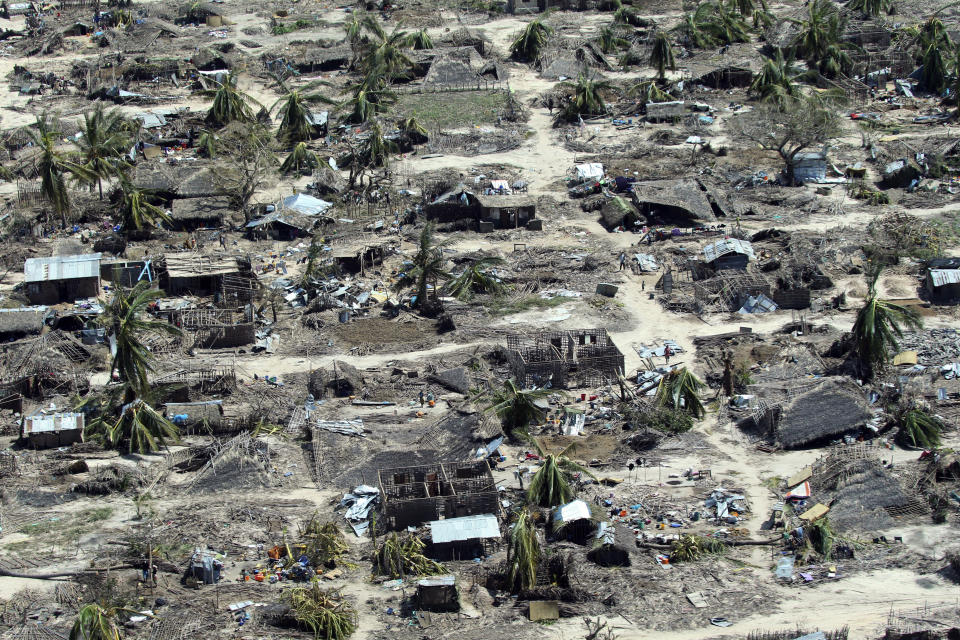 FILE -- In this Wednesday, May 1, 2019, file aerial photo of the widespread destruction caused by Cyclone Kenneth when it struck Ibo island north of Pemba city in Mozambique. The country says that it needs $3.2 billion to recover from two powerful tropical cyclones that ripped through the southern African nation this year and left hundreds dead. (AP Photo/Tsvangirayi Mukwazhi, File)