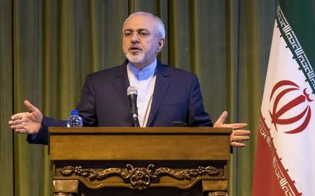 Iranian Foreign Minister Mohammad Javad Zarif gestures as he attends a joint news conference with his German counterpart Frank-Walter Steinmeier (not seen) in Tehran October 17, 2015. REUTERS/Raheb Homavandi/TIMA