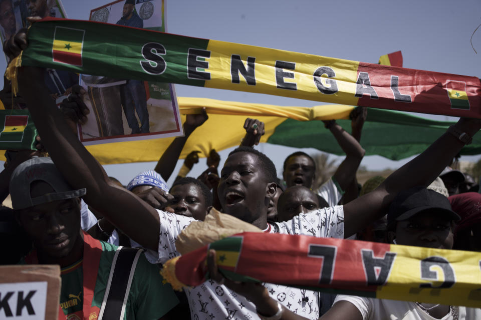 FILE - People shout slogans during a protest against the possibility of President Macky Sall to run for a third term in the presidential elections next year in Dakar, Senegal, Friday, May 12, 2023. West Africa’s regional bloc on Sunday, Feb. 4, 2024 called for dialogue to resolve the political crisis in Senegal as opposition leaders rejected the decision by the country’s leader to postpone the Feb. 25 presidential election over an electoral dispute between parliament and the judiciary. (AP Photo/Leo Correa, File)