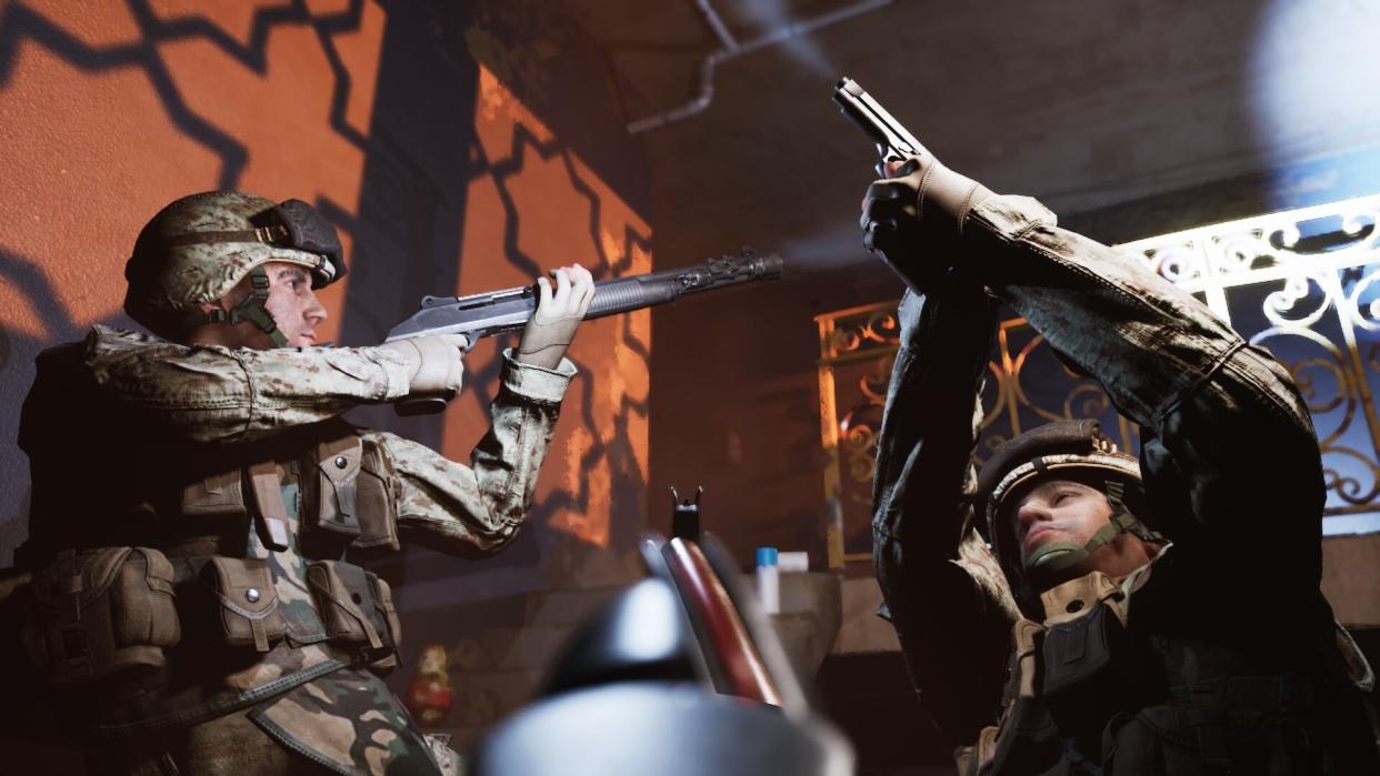  Two marines meet after clearing a building 