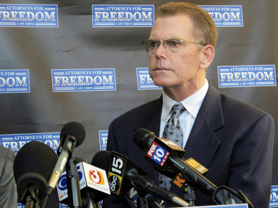 FILE - In this Feb. 2, 2018, file photo, Douglas Haig takes questions from reporters at a news conference in Chandler, Ariz. Haig is due to plead guilty to illegally manufacturing tracer and armor-piercing bullets found in a high-rise hotel suite from which a gunman carried out the Las Vegas Strip massacre in October 2017. (AP Photo/Brian Skoloff, File)