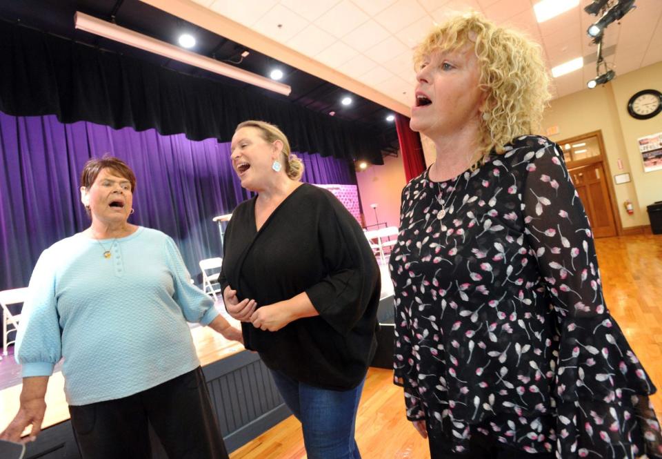 Rehearsing a song for the upcoming JM Productions 45th anniversary cabaret show that will be presented on Sept. 30 at the Woodward School in Quincy are, from left, Sheila Fahey, of Dorchester; Jennifer Fahey, of Dorchester; and Ann Kenneally-Ryan, of Quincy, Thursday, Sept. 15, 2022.