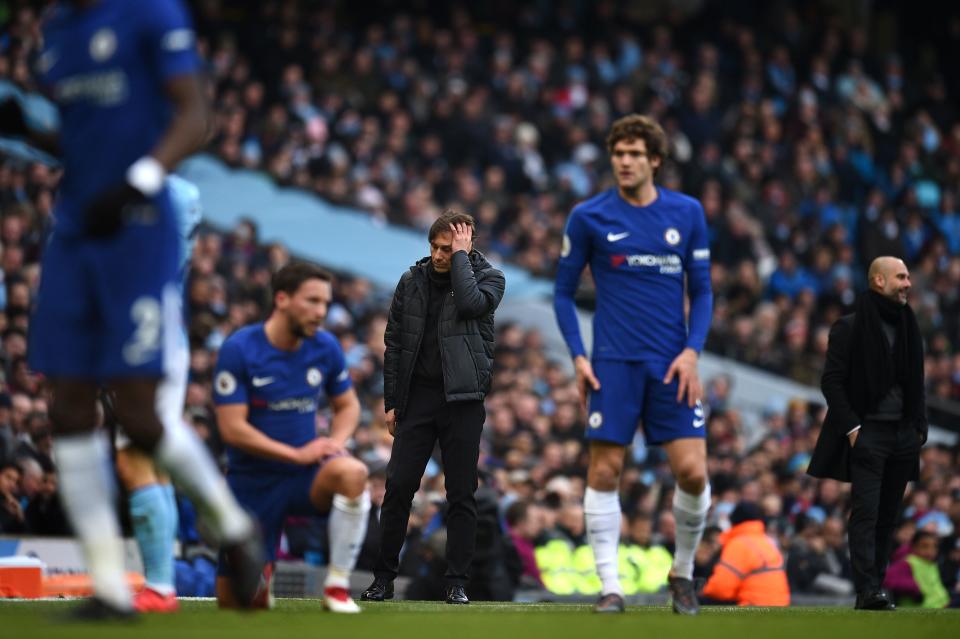 Antonio Conte and Chelsea players react during a 1-0 loss to Manchester City. (Getty)