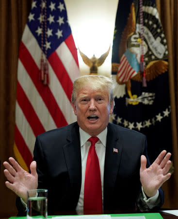 U.S. President Donald Trump speaks after competing measures to end the partial U.S. government shutdown fell short in the Senate, in the Cabinet Room of the White House in Washington, U.S., January 24, 2019. REUTERS/Kevin Lamarque/Files