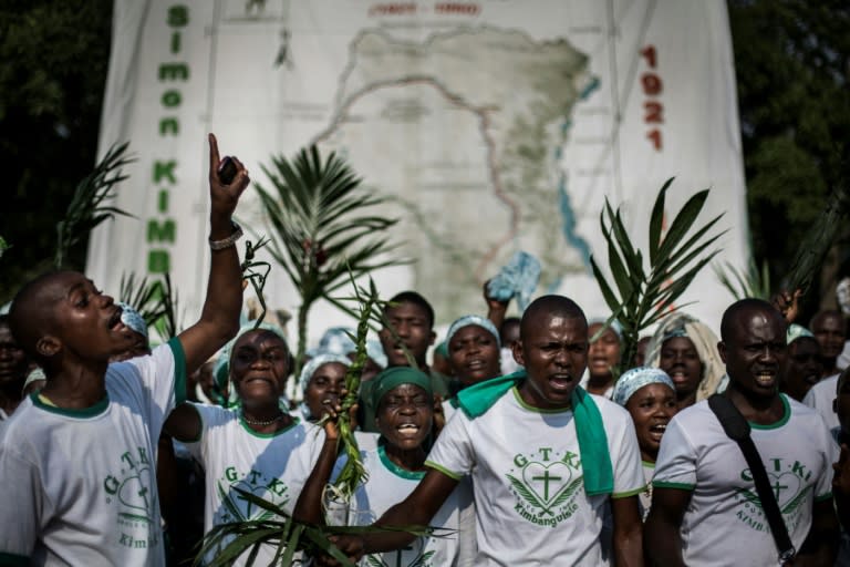 A Kimbanguist choir in the Democratic Republic of Congo celebrate "true Christmas" in tribute to Simon Kimbangu Kiangani, held to be the second reincarnation of the Holy Spirit