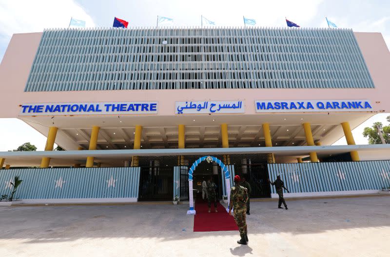 Somali military officers are seen outside a renovated Somalia's National Theatre in Mogadishu