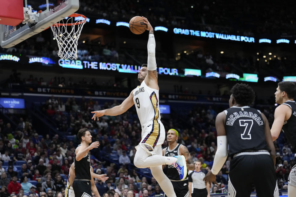 New Orleans Pelicans center Willy Hernangomez (9) goes to the basket in the first half of an NBA basketball game against the San Antonio Spurs in New Orleans, Thursday, Dec. 22, 2022. (AP Photo/Gerald Herbert)