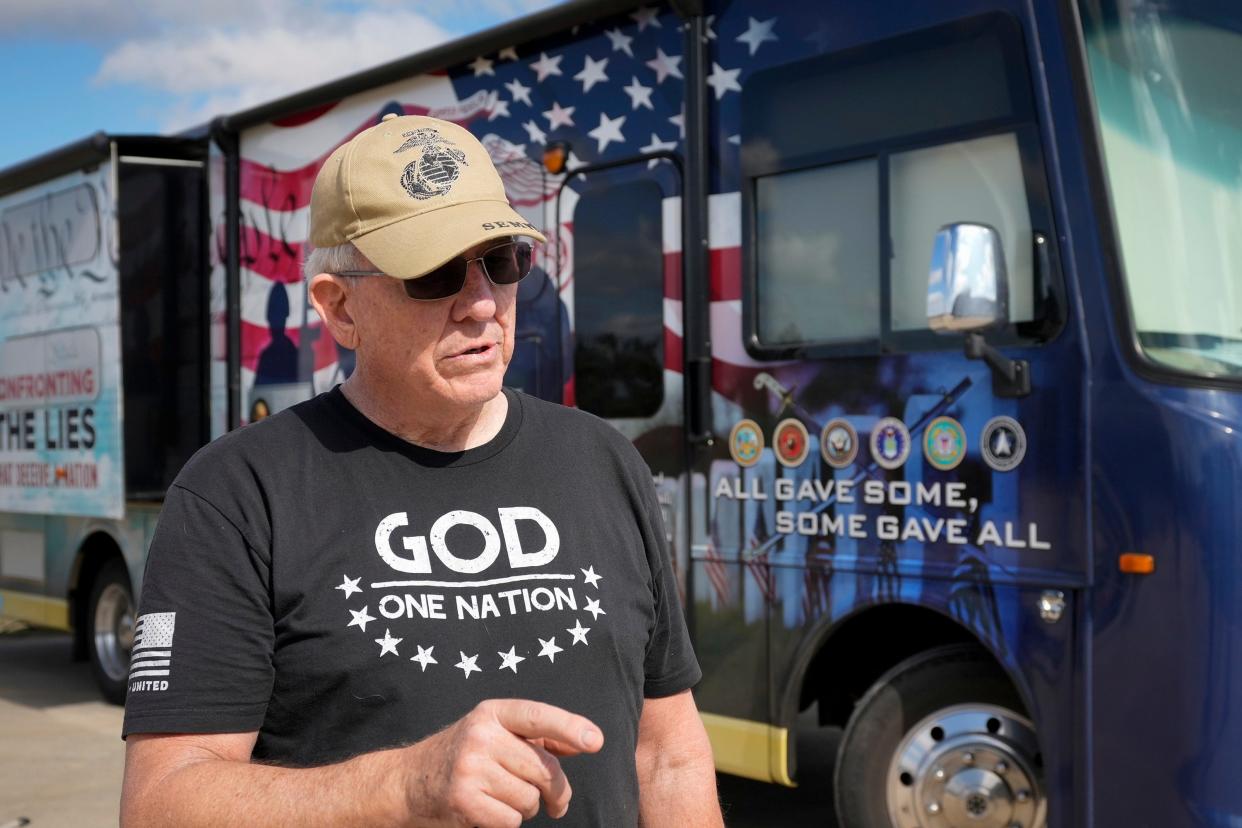 Craig Hudgins, one of the organizers of the Take Our Border Back Convoy, waits for a rally to begin in Dripping Springs on Thursday February 1, 2024.