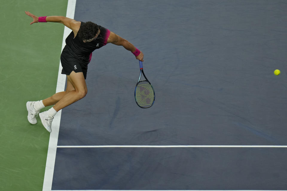 Ben Shelton of the United States returns a shot to his compatriot Sebastian Korda during the men's singles quarterfinal match in the Shanghai Masters tennis tournament at Qizhong Forest Sports City Tennis Center in Shanghai, China, Thursday, Oct. 12, 2023. (AP Photo/Andy Wong)