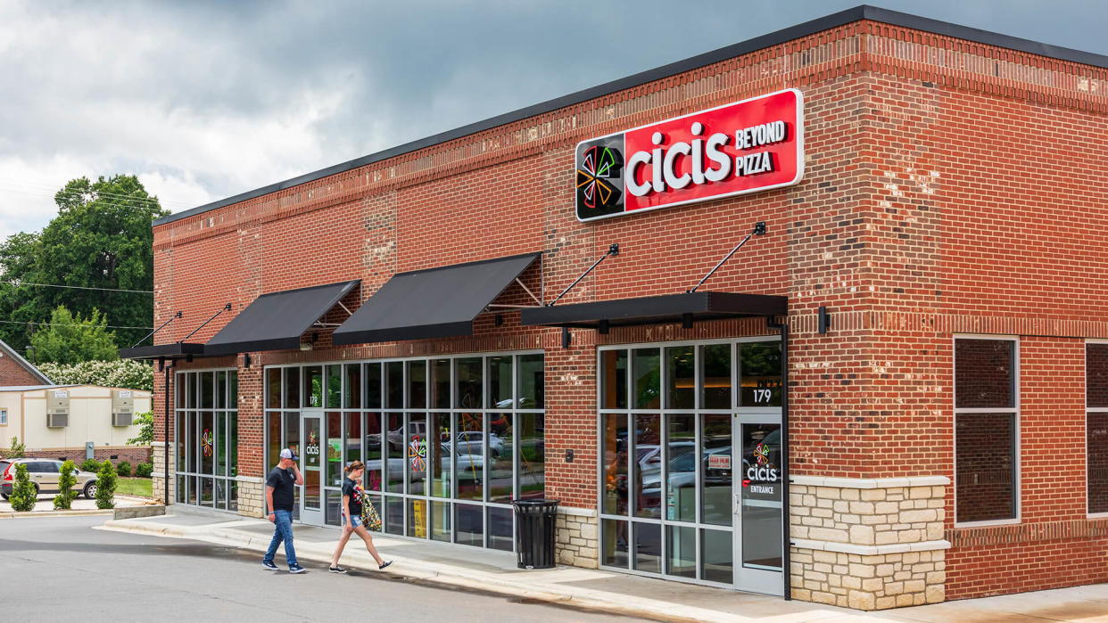STATESVILLE, NC, USA-JUNE 19, 2019: A local Cicis Beyond Pizza restaurant, with customers entering the building.