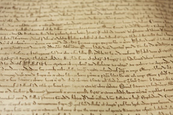 A close-up of the Magna Carta, written in Medieval Latin.