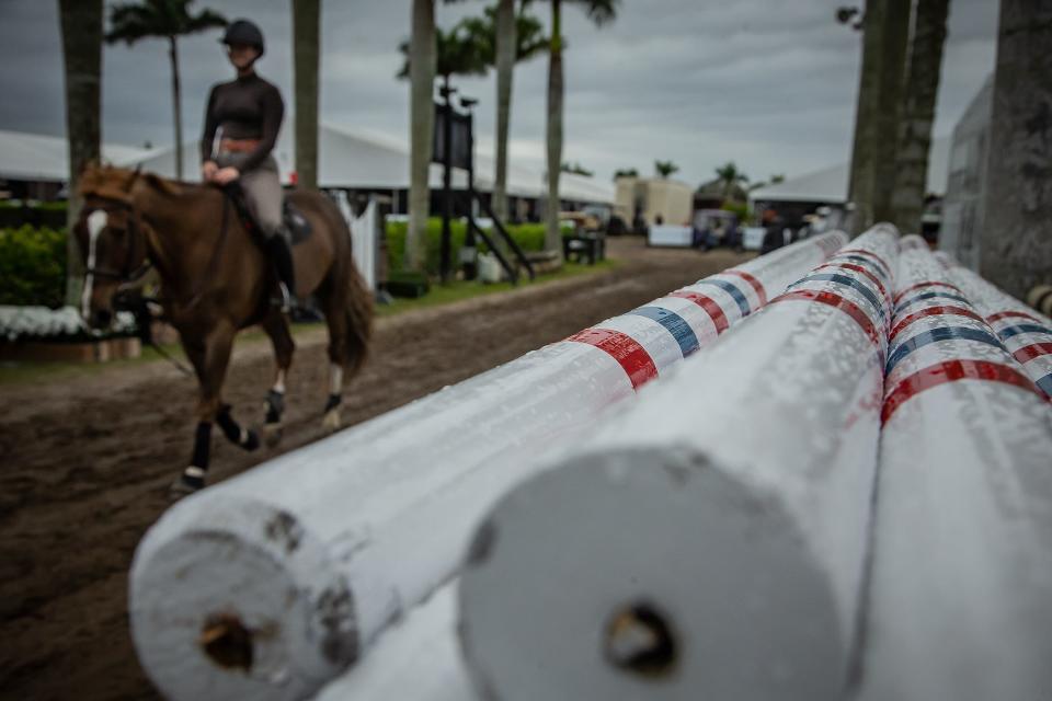 Rain clings to jumping equipment during Winter Equestrian Festival events at Palm Beach International Equestrian Centers in Wellington, Fla. on January 11, 2024.