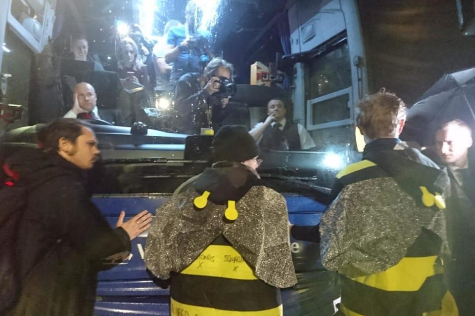 Bees attaching themselves to the Tory campaign bus (Extinction Rebellion)