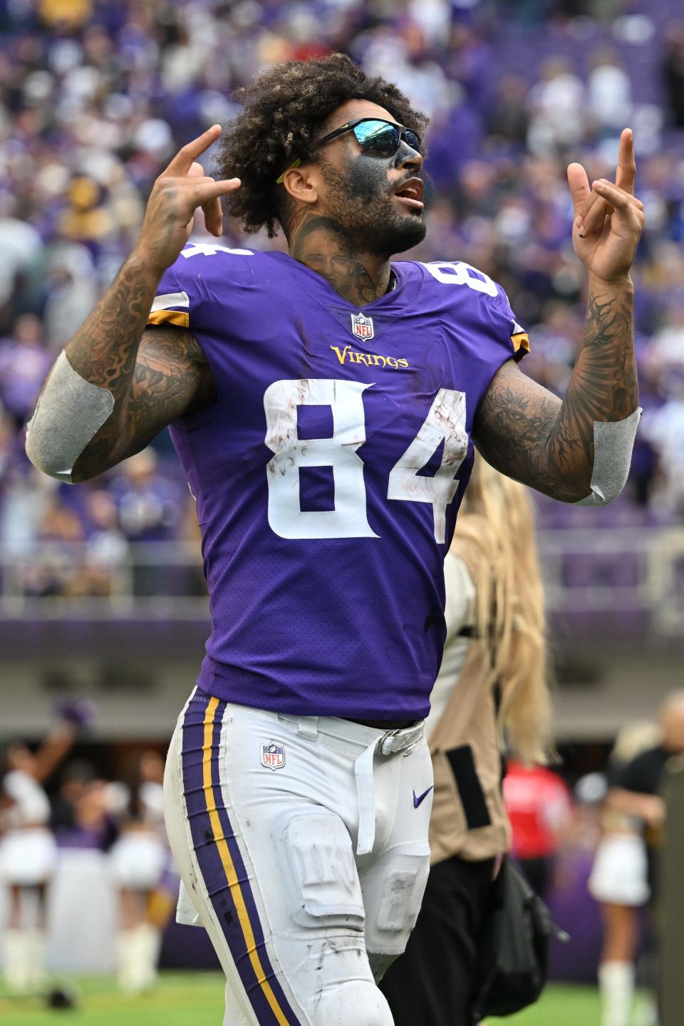 Oct 30, 2022; Minneapolis, Minnesota, USA; Minnesota Vikings tight end Irv Smith Jr. (84) walks off the field after the game against the Arizona Cardinals at U.S. Bank Stadium.