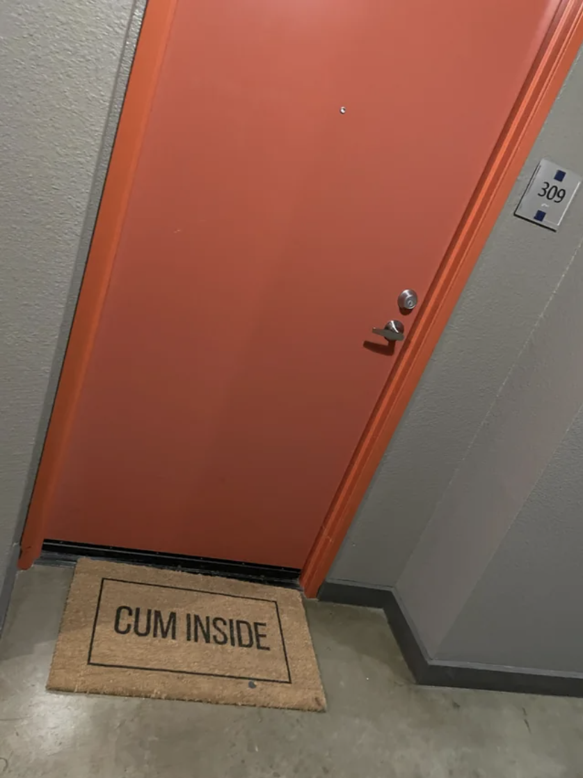 The welcome mat reads "cum inside" with cum spelled c-u-m